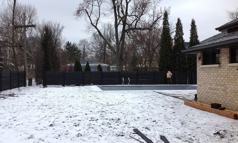 A photo of the custom fence for the Chavez family's new home installed by First Fence