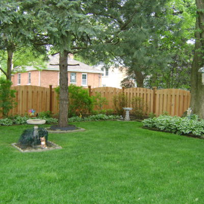 Photo of a 5 foot shadowbox arch fence installed by First Fence Company