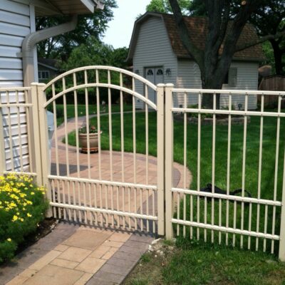 Photo of an aluminum arched walk gate designed and installed by First Fence