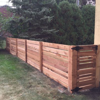 Photo of a custom horizontal wood fence installed by First Fence Company