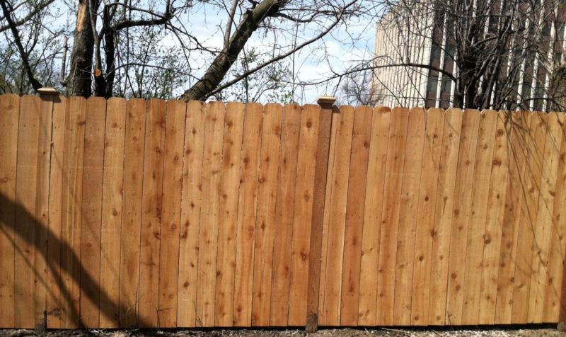 Photo of a solid board dog ear fence installed by First Fence Company