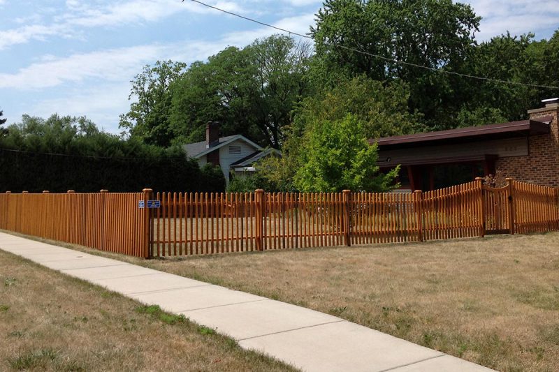 Photo of a custom ironwood fence installed by First Fence