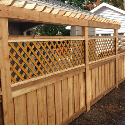 Photo of a custom wood pergola designed, built and installed by First Fence Company in Hillside, IL
