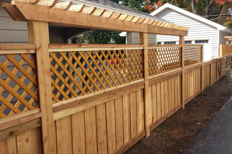 Photo of a custom wood pergola designed, built and installed by First Fence Company in Hillside, IL