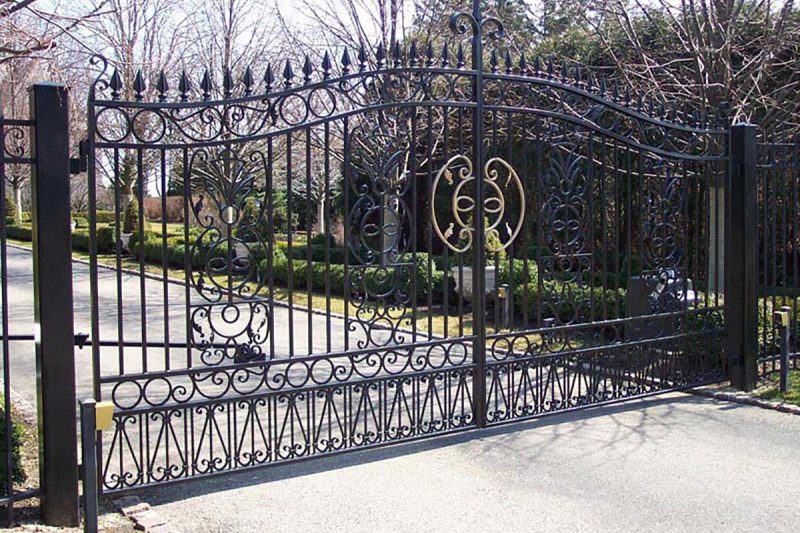 Photo of an ornate iron gate - First Fence