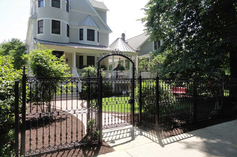 Photo of custom powder coated iron fence and gate- First Fence