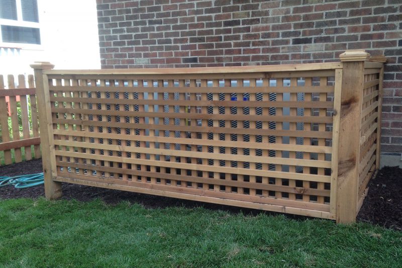Photo of a custom designed lattice fence installed by First Fence
