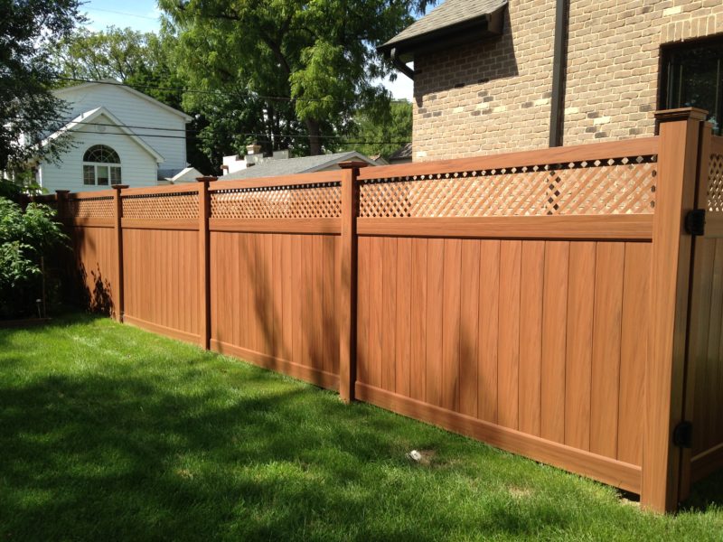 Photo of a brown Mocha Ottawa PVC/vinyl fence designed and installed by First Fence