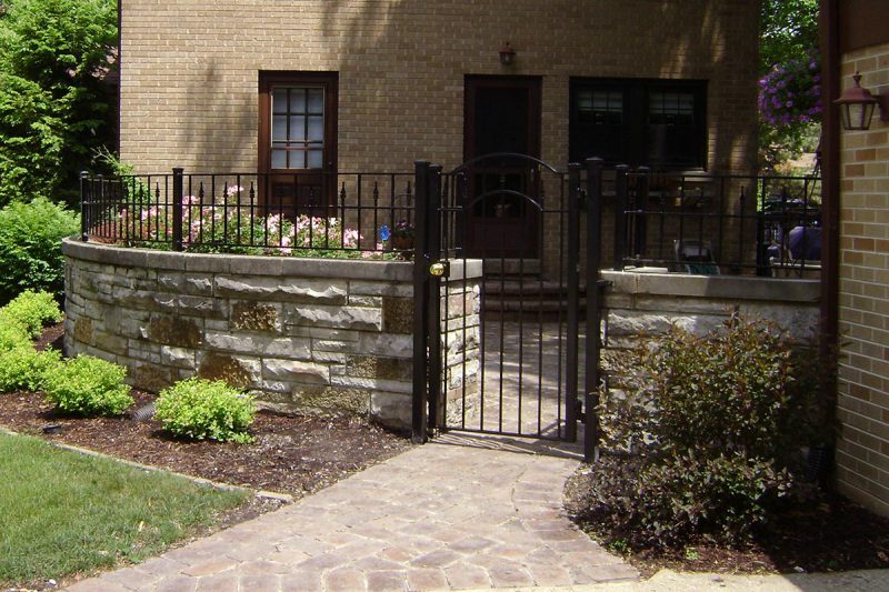 Photo of a custom pillar fence installed by First Fence Company