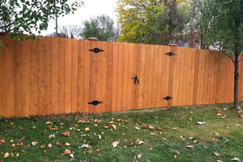 Photo of a pre-stained fence installed by First Fence
