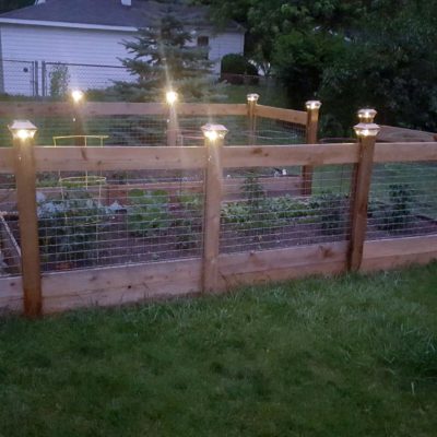 Raised garden custom designed and installed by First Fence Company