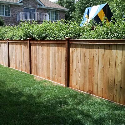 Photo of a custom wood fence installed by First Fence Company in Hillside, IL