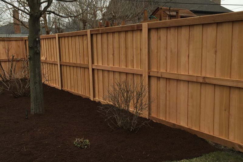 Photo of a custom wood fence installed by First Fence