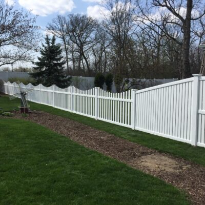 PVC white fencing with transition from 6 foot to 4 foot