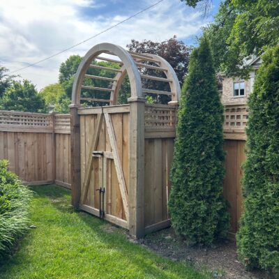 Custom Wood Fence with Double Gate and Arbor in Western Springs, IL